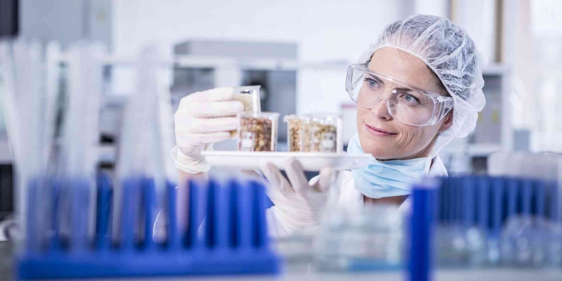 scientist-in-lab-examining-seed-samples-2022-12-16-22-30-01-utc